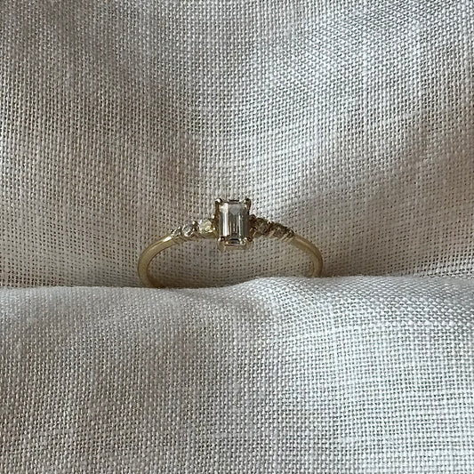 DAINTY EMERALD CUT 14K GOLD RING
